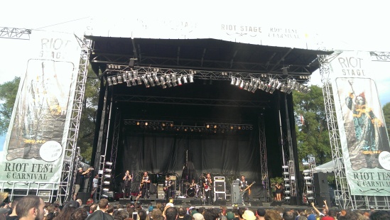 Rocket From The Crypt playing music and telling jokes at Riot Fest 2013.